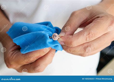 Jeweller Hand Polishing and Cleaning Jewelry Diamond Ring Stock Image - Image of household, gold ...