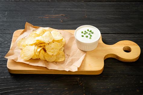 Potato chips with sour cream dipping sauce 3187624 Stock Photo at Vecteezy