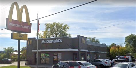 Guns found, 2 youths arrested after crashing car in McDonald's parking ...