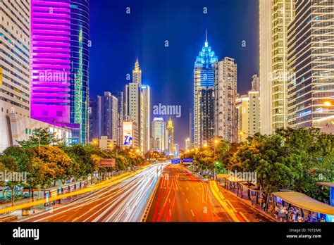 SHENZHEN, CHINA - OCTOBER 28: This is a night view of modern city buildings in the downtown area ...