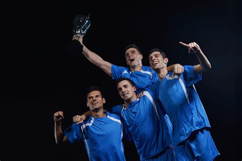 soccer players celebrating victory 11628289 Stock Photo at Vecteezy