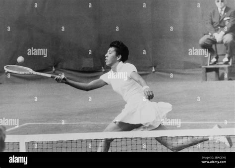 Althea Gibson, playing tennis at Forest Hills, NYC in 1957. She won the ...