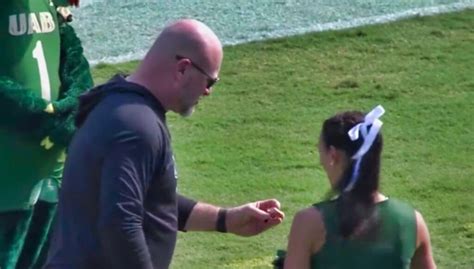 New UAB Coach Trent Dilfer Shows SB Ring To Team Cheerleader