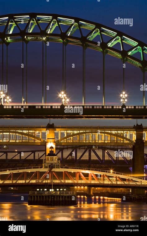 Four Tyne bridges in Newcastle upon Tyne, England, illuminated at dusk ...