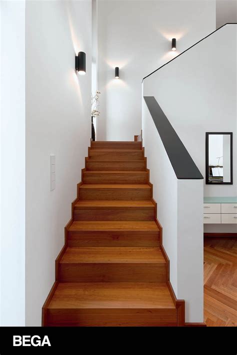 Narrow Wooden Staircase in Mid-Century Modern Home | Staircase wall lighting, Staircase lighting ...