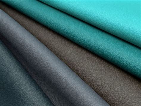 several different colors of leather are shown in close up view, including teal and grey