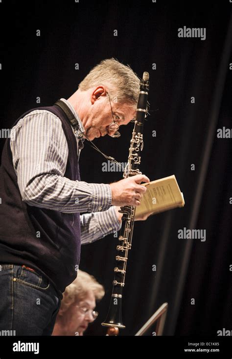 Basset Clarinet: Nicholas Cox, clarinet soloist, examining the score of ...