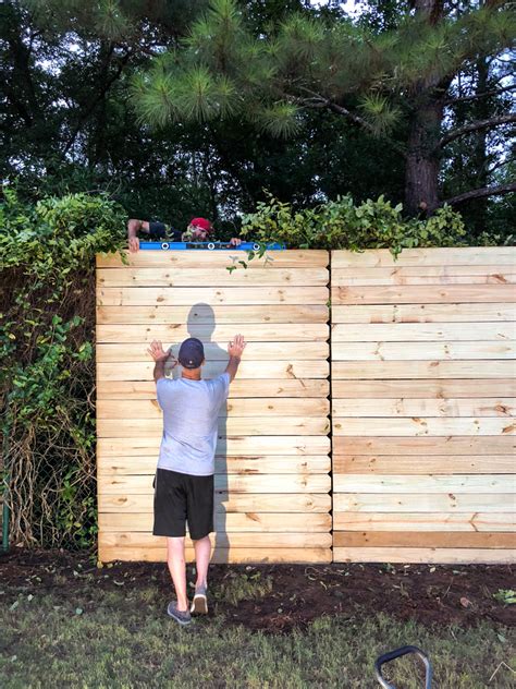 How to Build A Wood Fence On A Chainlink Fence - Bower Power