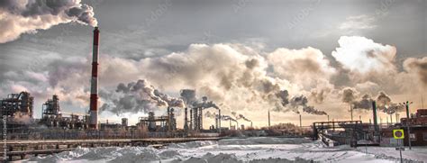 Smoke over the industrial complex. Environmental pollution. Stock Photo | Adobe Stock