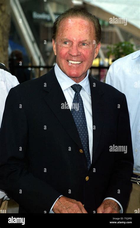 Frank Gifford arrives for the press conference announcing the ...