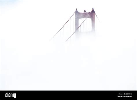 SAN FRANCISCO, California - San Francisco's Golden Gate Bridge obscured by dense fog Stock Photo ...
