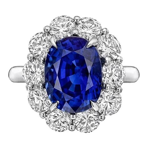 5.45 Carat Sapphire Diamond Cluster Ring For Sale at 1stdibs