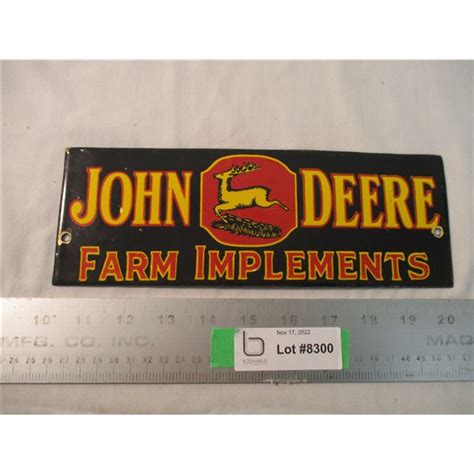 John Deere Farm Implements Porcelain Sign - 10x3.5 - Bodnarus Auctioneering