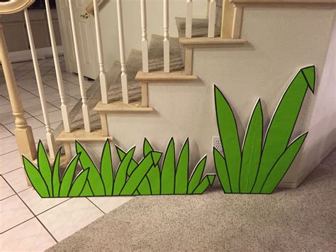 Magalie Sarnataro's props Jungle vignette Grass cutouts glued wrapping paper | Jungle ...