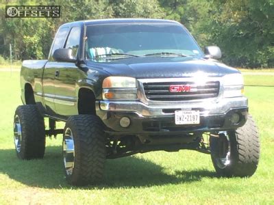 2006 GMC Sierra 1500 with 22x14 -76 American Truxx The Bomb and 37/13 ...