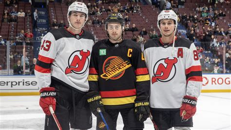 The Hughes brothers had a historic night on the ice, playing in the same game for the first time ...