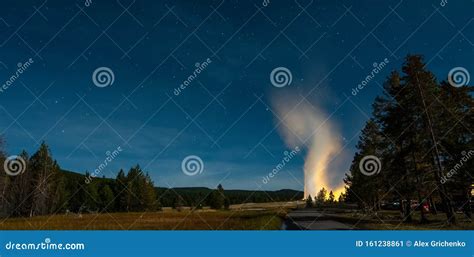 Eruption of Old Faithful Geyser at Yellowstone National Park at Night Stock Image - Image of ...