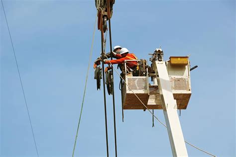 High Voltage Power Line Construction Photograph by Jim West - Fine Art America