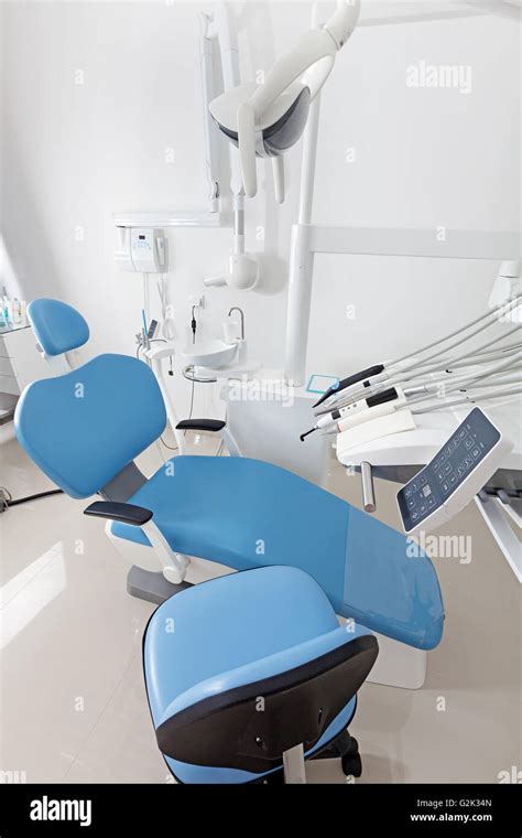 Modern dentist's chair in a dental office Stock Photo - Alamy