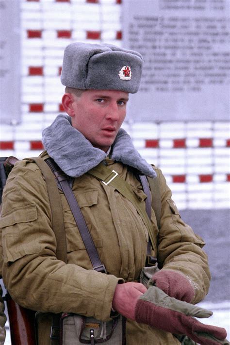 A Soviet soldier of the 2nd Guards Tamanskaya Motor Rifle Division ...