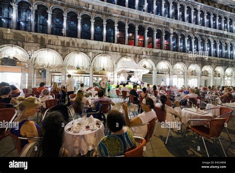 cafe on St Mark's Square at night, Venice, Italy; Piazza San Marco ...