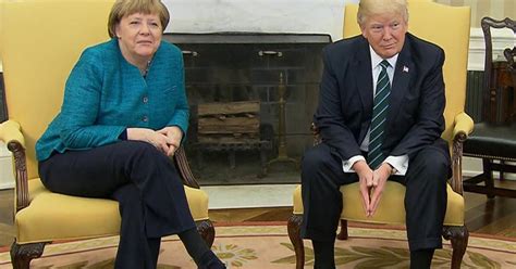 Donald Trump, Angela Merkel avoid handshake during photo op.