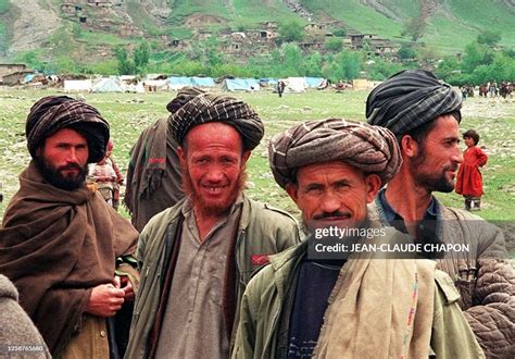 A group of ethnic Tajiks in Kozar village of northern Takhar province ...