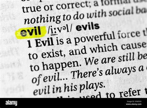 Highlighted word evil concept and meaning Stock Photo - Alamy