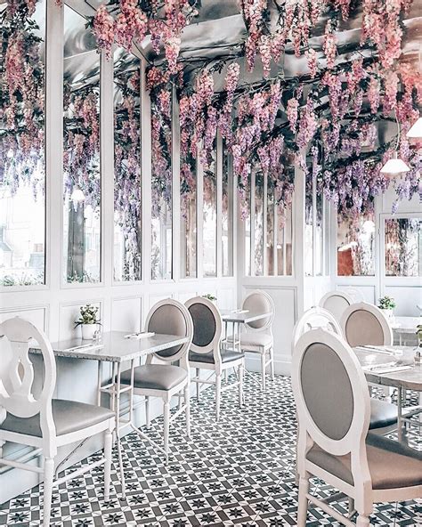 The best cafe interior key points: ️ Fancy floor ️ All white eveything ️ Purple flowers ...