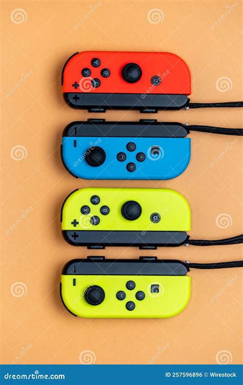 Nintendo Switch Joy-Cons Aligned in a Row. Yellow Blue and Red Joy-Cons ...