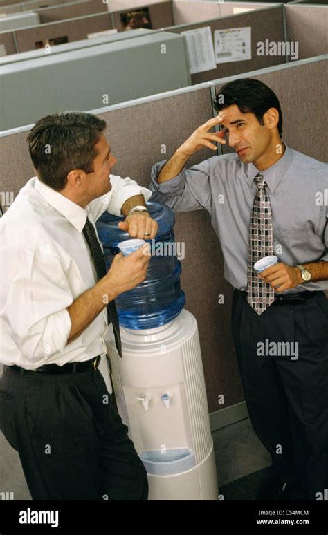 Watercooler talk hi-res stock photography and images - Alamy