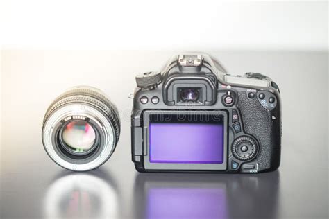 Professional Photographing: Back View of a Professional Reflex Camera and an Photo Lens Stock ...