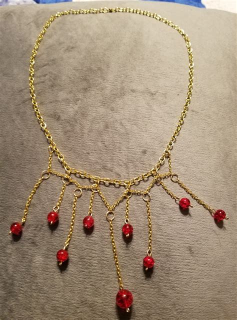 [OC] Wife made a Necklace of Fireballs! : r/DnD