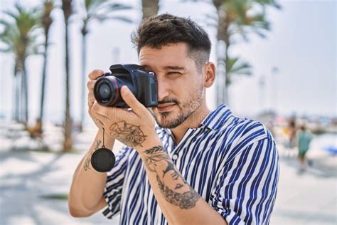 Young Handsome Man Using Dslr Photography Camera by the Sea Stock Image - Image of person ...