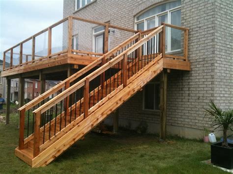 Second story cedar deck and stairs with glass railing | All Things Paradisaic | Pinterest ...