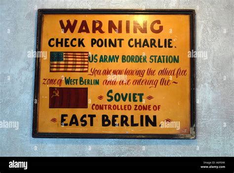 Checkpoint Charlie sign from the cold war era of Berlin Stock Photo - Alamy