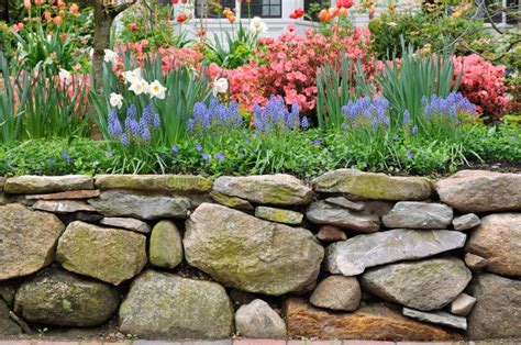 Dry Stone Wall and Colorful Garden Stock Image - Image of landscaping ...