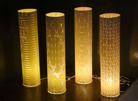 Home Lighting Design take tall cylinders and put a LED candles in it ...