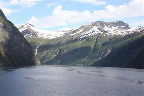 Snowy mountains at geirangerfjord, norway free image download