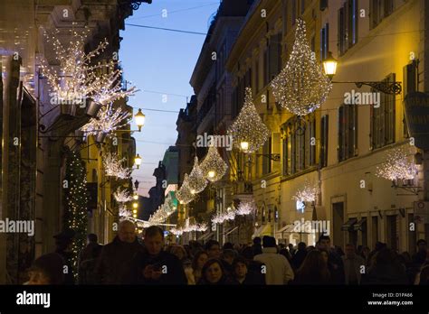 Via Condotti Rome Italy Christmas decorations lights crowd of people in street Stock Photo - Alamy