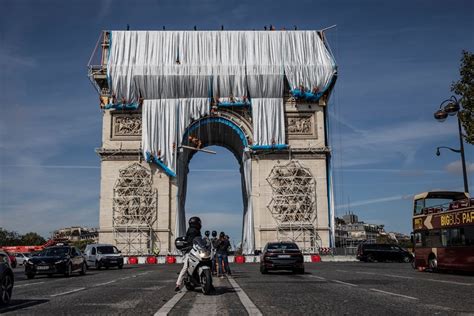 Wrapping of Arc de Triomphe begins in Paris art installation | Arts