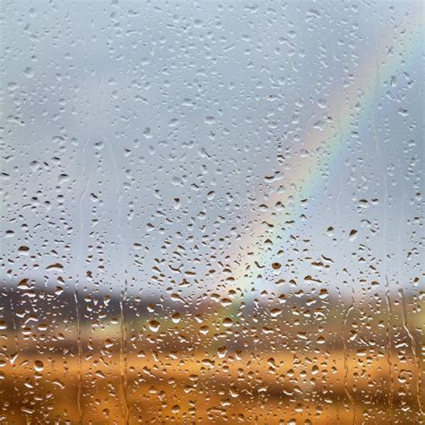 Rainbow Through Rained Window Stock Photo - Image of closeup, aqua ...