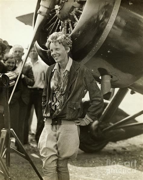 Amelia Earhart Beside Her Plane by Bettmann