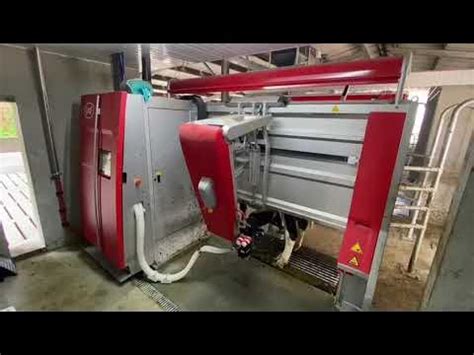 Low cost conversion - retrofitting two Lely robots into an existing shed - YouTube