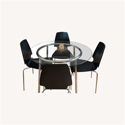 IKEA Dining Set with Glass Table and Black Chairs - AptDeco