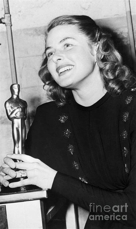 Ingrid Bergman Holding Oscar Award by Bettmann