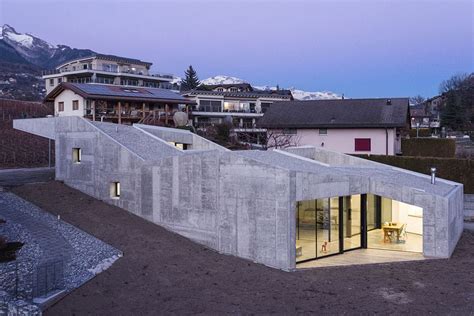 Concrete home climbs up small, sloping site in Switzerland - Curbed