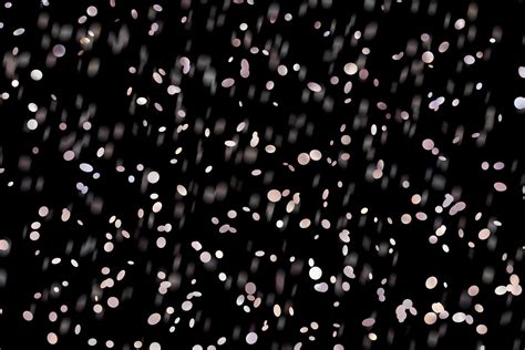 light sparkle Abstract stylish light effect on a black background and ...