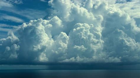 Water Evaporating from the Surface of the Sea Condenses To Form Great Clouds Stock Footage ...