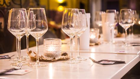 Clear Wine Glasses on White Wooden Table · Free Stock Photo